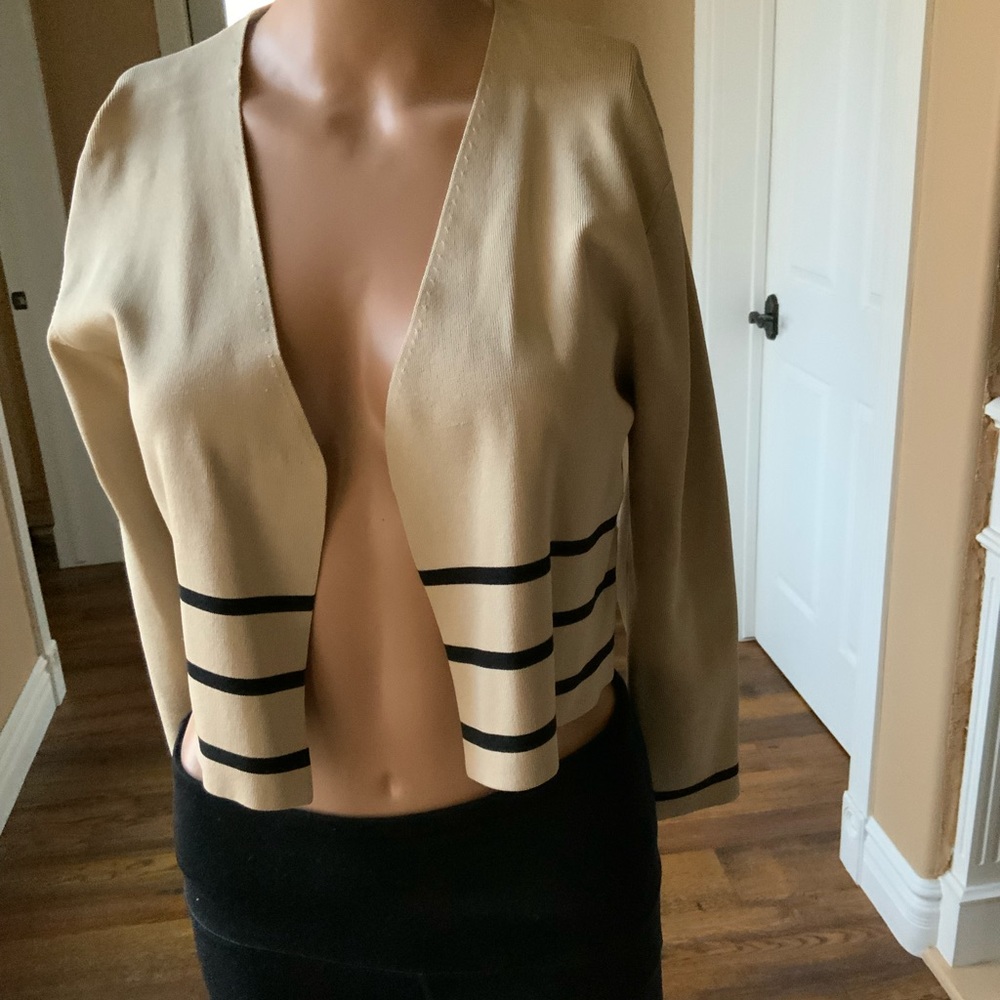 beige and black shrug